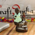 eCraftIndia Karate Style Monk Buddha Decorative Showpiece with 10 Free Smoke Backflow Scented Cone Incenses